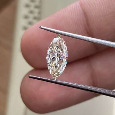 0.97cts GIA certified natural marquise shaped light brown colour diamond with VS2 clarity