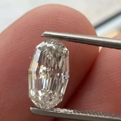 1.04ct GIA certified natural M color oval step cut diamond with VS2 clarity