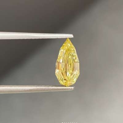 1.23cg GIA Certified Natural Fancy Yellow I1 Clarity Elongated Pear Shape Step Cut Diamond