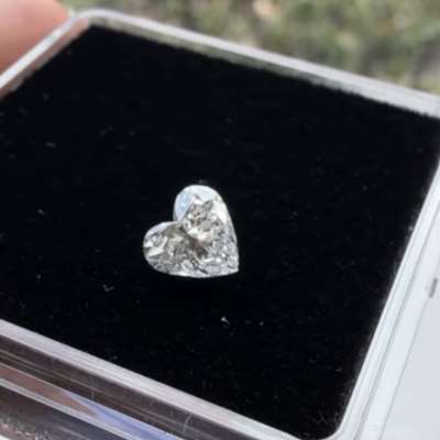  0.90ct GIA certified heart shape diamond with a bright G color and clean VS1 clarity