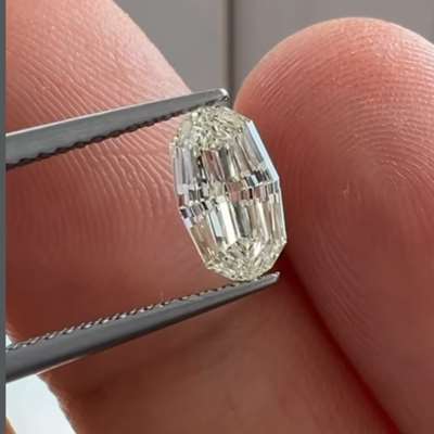 0.88ct GIA Certified Natural K Color VS1 Clarity Moval Shape Step Cut Diamond