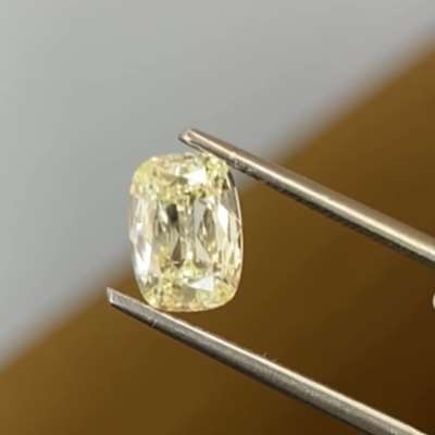 A 1.01cts GIA certified natural U-V range VS2 clarity old cut cushion shape diamond with a beautiful elongated outline