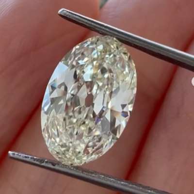 2.37cts GIA certified natural M color VS1 clarity old cut oval shape diamond