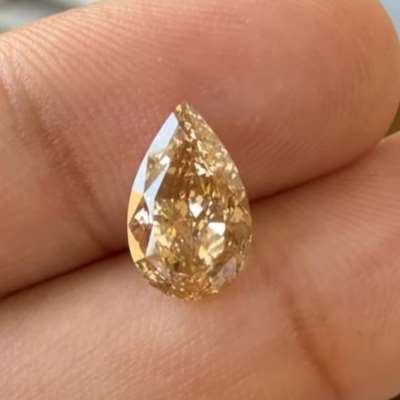 A 2.52cts Natural orangy brown VVS2 clarity pear shape diamond