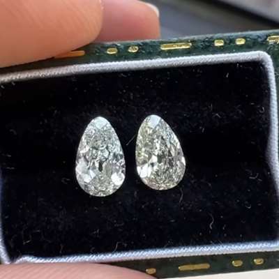 0.45ct + 0.46ct GIA certified old cut egg shapes. L VS2 and M VVS1