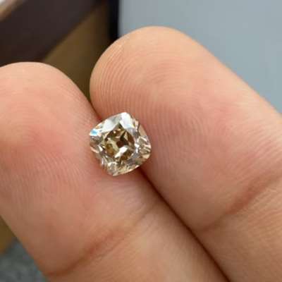 A 1.00ct GIA certified natural Fancy Yellowish Brown SI1 old cut cushion 