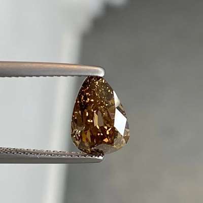 1.79ct GIA Certified Natural Fancy Dark Orange Brown I1 Clarity Egg Shape Old Cut Diamond.
