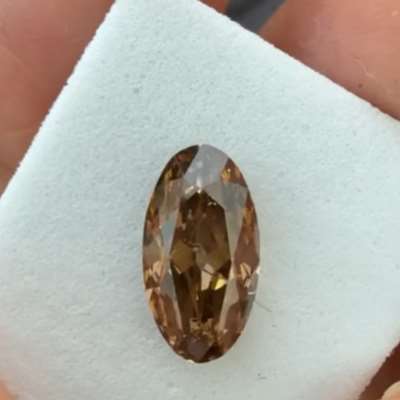 1.54cts natural dark orangy brown SI1 clarity old cut moval shape diamond 