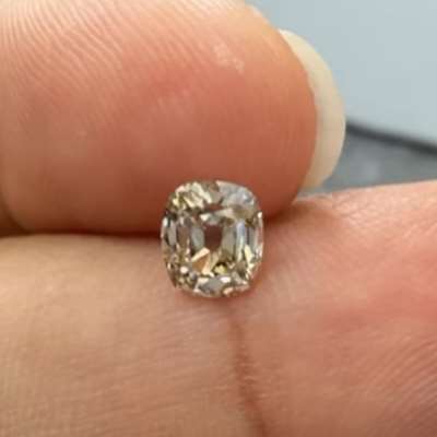 0.60cts GIA certified natural W-X range, light brown VS2 clarity old cut cushion shape diamond