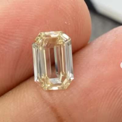1.05cts natural U-V range light yellow VVS2 clarity emerald cut diamond