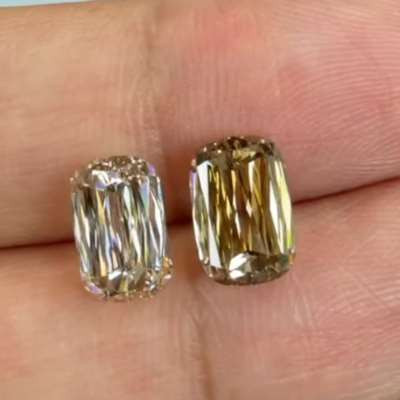 Matched pair of GIA Certified elongated scissor cut diamonds.