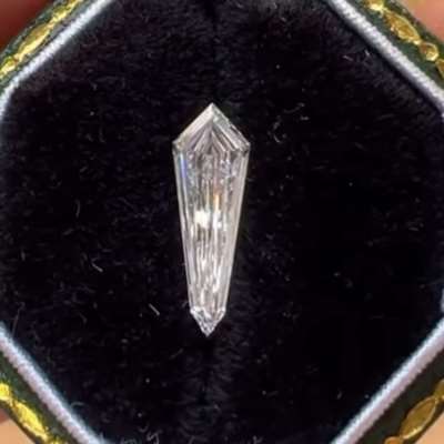0.56cts GIA certified natural D color VVS1 clarity super long kite step cut diamond