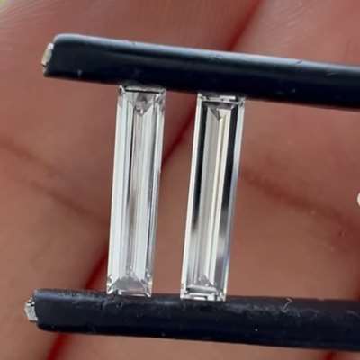 0.48cts total weight pair of natural G color VVS2 baguette diamonds