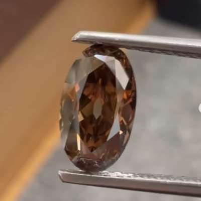 1.02cts natural dark brown VVS2 clarity old cut oval shape diamond 