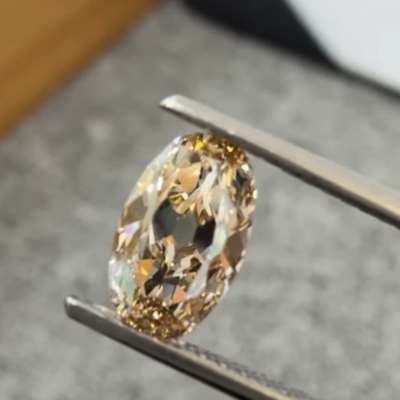 1ct natural peachy brown VS1 old cut moval