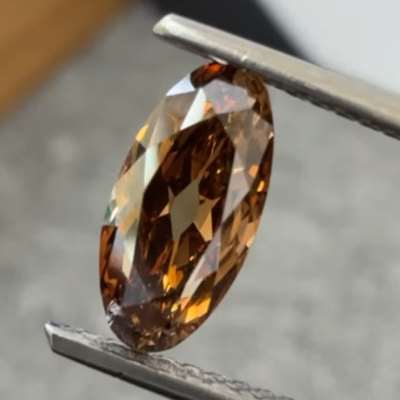 1.08cts natural dark orangy brown VS1 old cut moval
