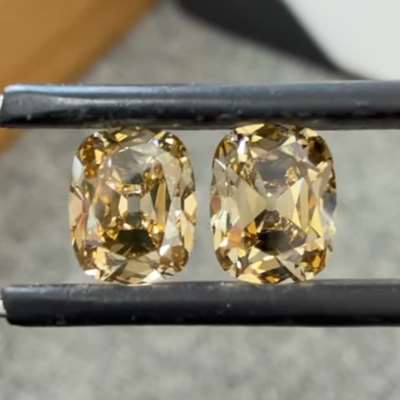 1.32cts & 1.28cts natural peachy brown VVS2 & VS1 old cut cushion shape diamond