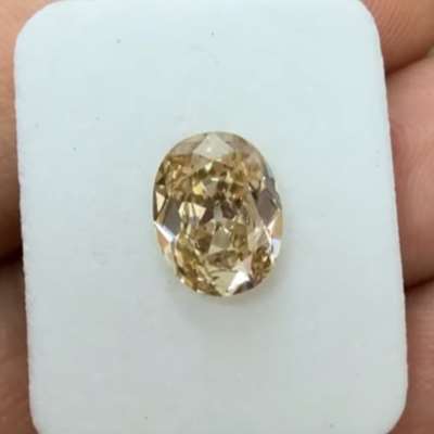 1.39cts natural champagne brown VS2 clarity old cut oval diamond