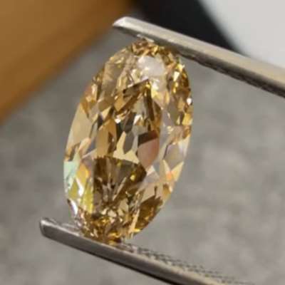 1.54cts natural champagne brown VVS2 old cut moval