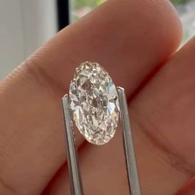 0.95cts natural M, faint brown SI1 old cut moval shape diamond