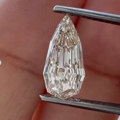 1.20cts GIA certified natural N, very light brown VVS2 long step cut pear