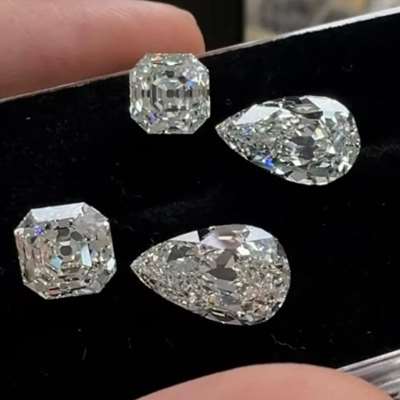 GIA certified Natural Old Antique Cut Asscher & Old Antique Cut Pears Matching Pair Layout. he okd cut asschers are 2ct each and are GIA Certified L Color VS1 & VS2 Clarity respectively Also the pears are 3.11ct & 3.14ct GIA Natural M acolor VS1.