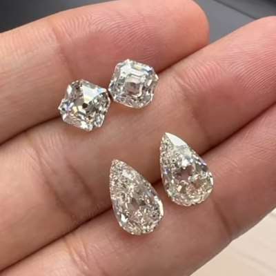GIA certified Natural Old Antique Cut Asscher & Old Antique Cut Pears Matching Pair Layout. he okd cut asschers are 2ct each and are GIA Certified L Color VS1 & VS2 Clarity respectively Also the pears are 3.11ct & 3.14ct GIA Natural M acolor VS1.