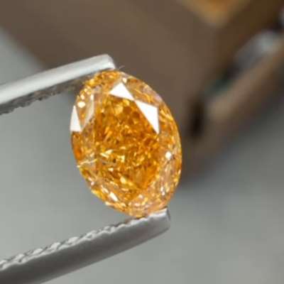0.71ct GIA Certified Natural Fancy Intense Yellow Orange VS1 Clarity Oval Shape Diamond