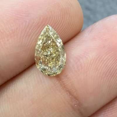 1.53cts natural brownish greenish yellow VS1 pear shape diamond