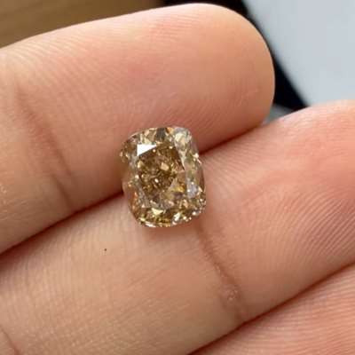 2.01cts natural peachy brown VS2 cushion shape diamond