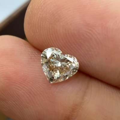 A 1.01ct natural U-V range, light brown SI1 heart shape diamond