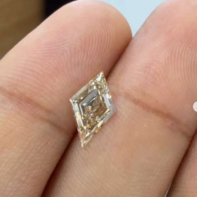0.90cts natural yellowish brown VS1 step cut lozenge shape diamond 