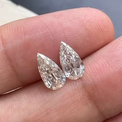 0.60ct & 0.62ct GIA Certified Matching Pair Of Natural K & M color Faint Brown Elongated Old Antique Cut Pear Shape Diamonds 
