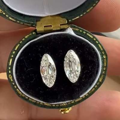 A 1.01ct GIA certified natural J color VVS2 paired with a 1.00ct GIA certified natural K color VVS2 old cut moval