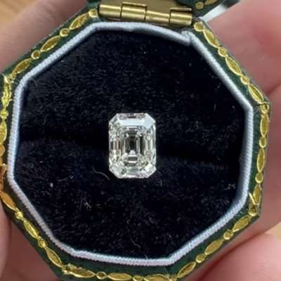  1.00ct natural M color VVS2 antique emerald cut diamond