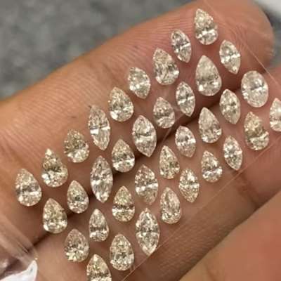 A beautifully curated 5.01ct layout of 36 natural light peachy brown VS-SI diamonds,