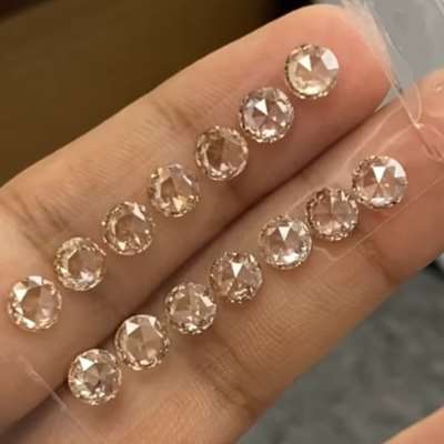 14-piece natural light brown rose cut round diamond layout weighs a total of 7.16cts