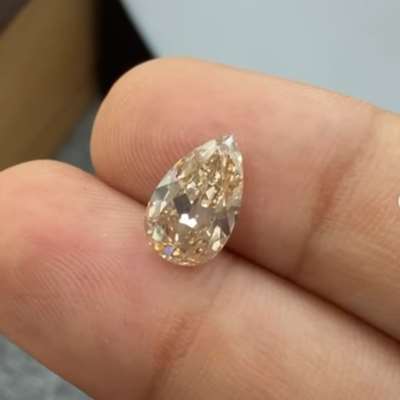 A 2.01ct natural peachy brown VVS2 old cut pear