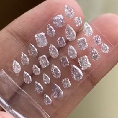 3.71-carat layout brings together 29 natural fancy brownish-pink diamonds