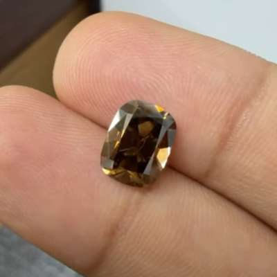 A 2.00ct natural dark espresso brown I2 old cut long cushion