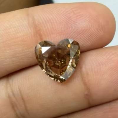 This 5.00ct natural dark brown I2 heart shape diamond 