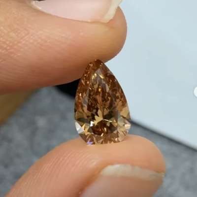 This 2.02ct natural copper brown SI2 pear shape diamond