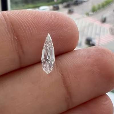 0.54CTS GIA CERTIFIED G COLOUR VVS1 CLARITY MODIFIED PEAR STEP CUT DIAMOND