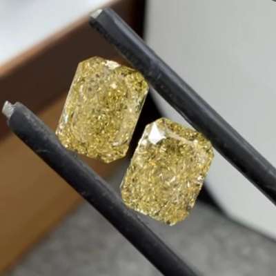  natural fancy brownish-yellow GIA certified, high-clarity grades of VS1 and VVS2 at 1.56 carats and 1.53 carats radiant shape diamond