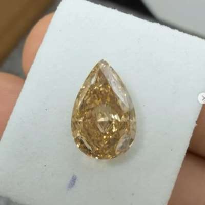  2.51ct natural brown VS1 pear shape diamond has a rich honey-brown shade 