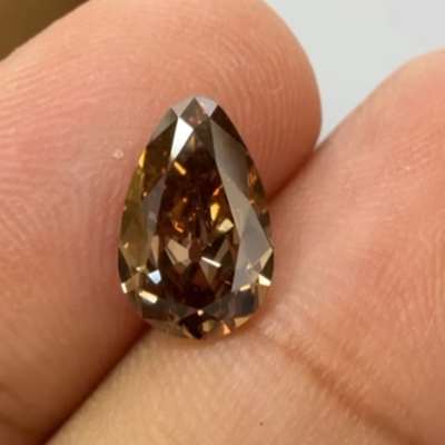 1.41cts natural dark brown SI1 old cut egg shape diamond
