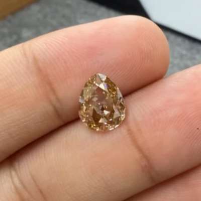1.51cts natural peachy brown VS1 old cut egg shape diamond 