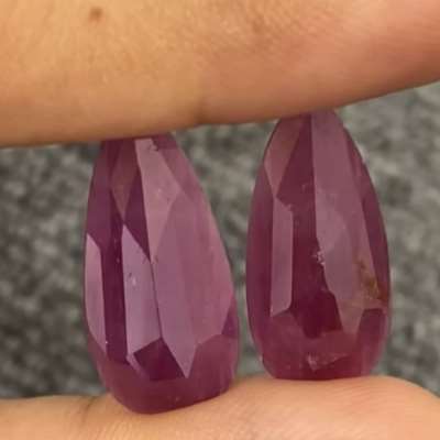 16.64cts natural Indian ruby pear pair with unbelievably long silhouettes