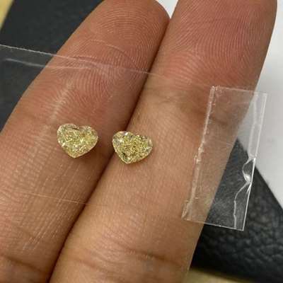 1.22ct Total Weight Matching Pair Of Natural Fancy Light Yellow VVS-VS Clarity Heart Shape diamonds