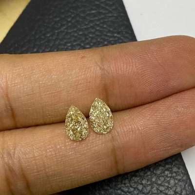 1.02ct & 1.12ct GIA Certified Matching Pair Of Natural Light Yellow (u to v & w to x range) VVS2 & VS1 Clarity Pear Shape Diamonds